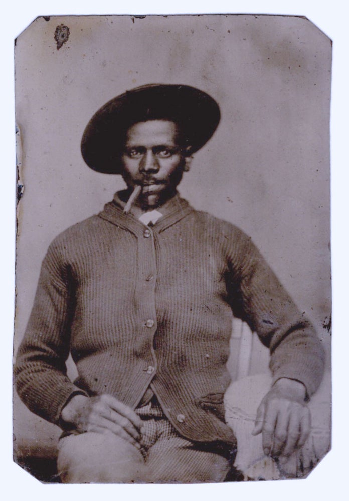 Item #5992 [Tintype portrait of an African American man smoking a cigar].