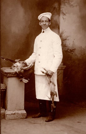Item #5995 [An African American chef with fowl.]. Wuttge’s Photo Studio