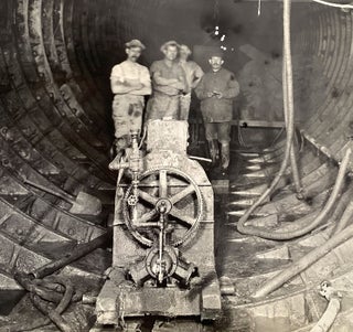 [Photo album documenting the construction of the East River subway tunnel.]