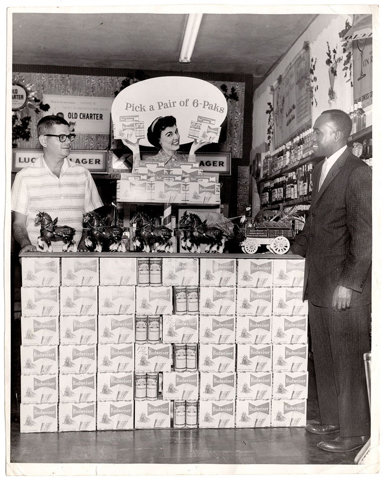 Item #7325 [Lot of photographs of an African American Budweiser representative.]. Harry H. Adams, photog, McCloud, Ralph Samuels, Irving C. Smith, Robert Moseley, Maceo B. Sheffield, Herbert Bruce Cross.